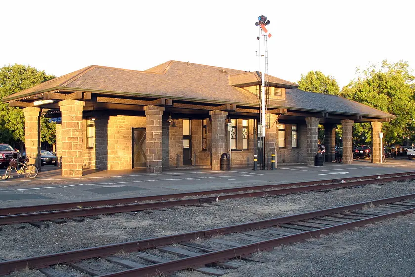 The historic stone railroad depot at Railroad Square in Santa Rosa, lit by late afternoon sun